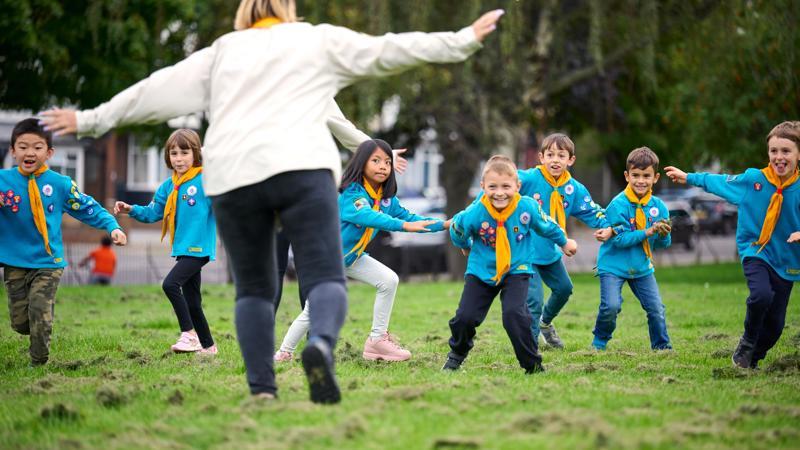 Leader having fun with Beavers